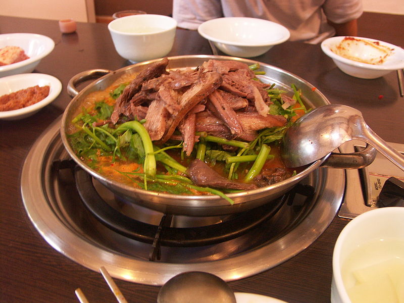 A dish prepared with dog meat.